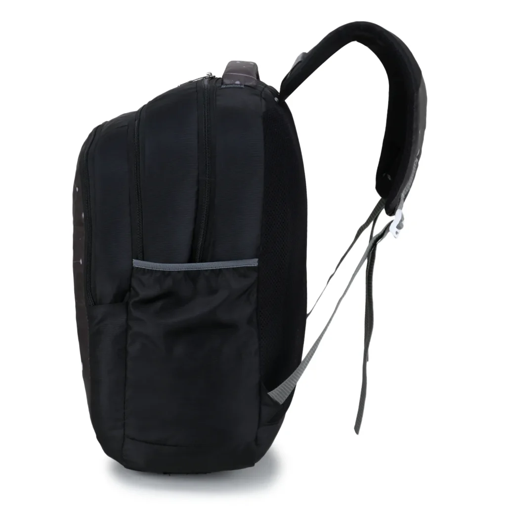SKUGG stylish black constellation-print backpack carried by a young woman walking on a modern college campus outdoors.